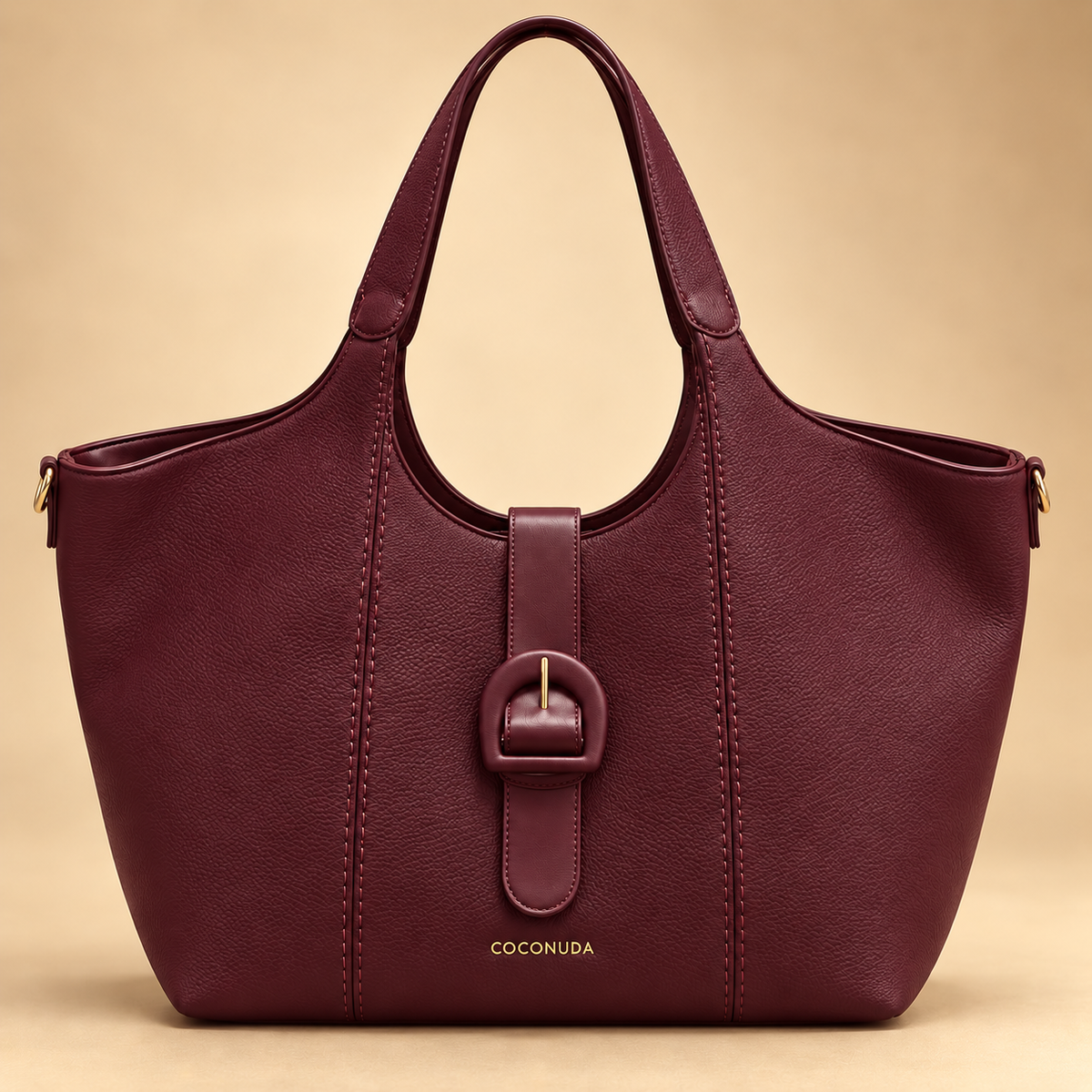Grand cabas à boucle bordeaux sur fond beige doré