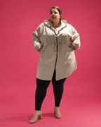 Parka longue déperlante beige grande taille avec poches latérales