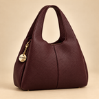 Petit sac souple grainé bordeaux sur fond beige doré
