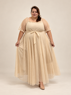 La Virevoltante beige portée de face